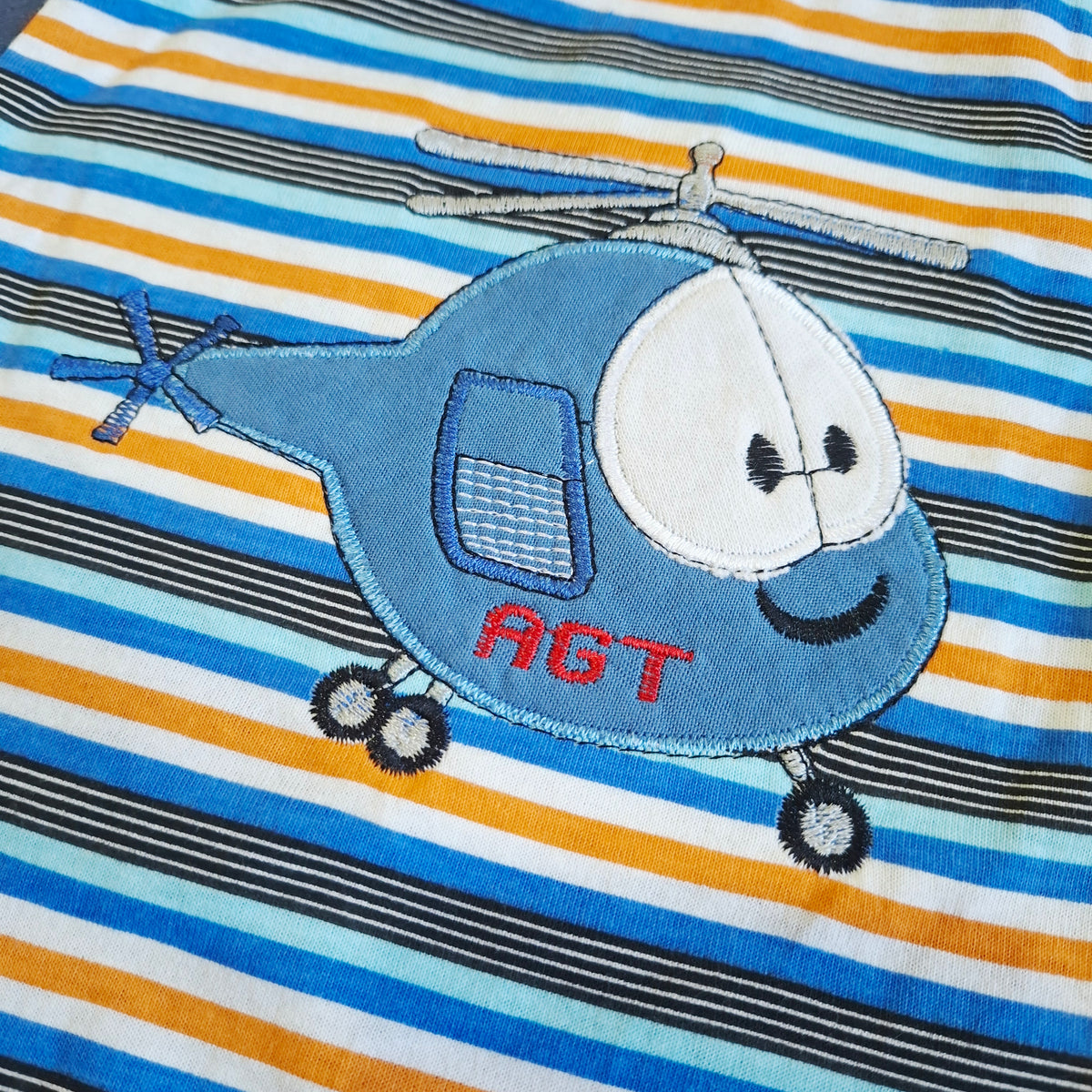 Remera helicoptero